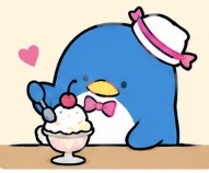Tuxedosam happily enjoying an ice cream dessert